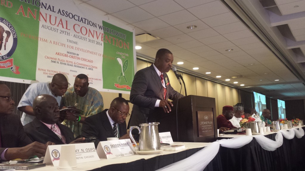 Professor Ernest Izevbigie, delivering his speech at the Edo National Convention. Seated next to him from the left are the convention Chairman and President, Akugbe-Oretin Club of Chicago, Deacon Lucky Osifo, the Chairman, ENAW Council of Presidents, Barr. Dickson Iyawe and ENAW National President, Mr.Franklin Omoruna. Photo also shows Prince Ademola Iyi-Eweka, seated on Professor Izevbigie's immediate left, representing the Oba of Benin. Photo, by Alltimepost.com  