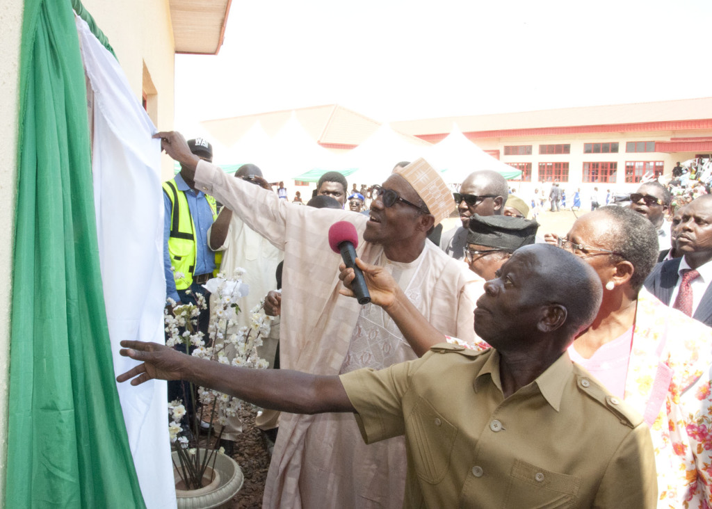 Maj-Gen Mohammadu Buhari, former Head of State and Governor Adams Oshiomhole at the commissioning of the Imaguero College in Benin City, on Saturday.