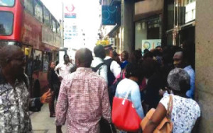 Nigerians on queue for their Bank Verification Number in London... on Friday.