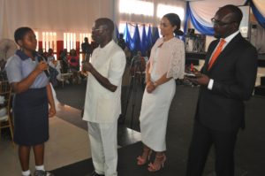 From left: Uwadoka Chinamerem a Senior Secondary School 3 Student of Emotan College; Governor Adams Oshiomhole of Edo State, his wife, Iara Oshiomhole and Commissioner for Education, Hon. Gideon Obhakhan at the 2nd edition of Edo State Festival of the Girl Child organised by "We Care Trust Foundation" at Imaguero College, Benin City, on Friday.